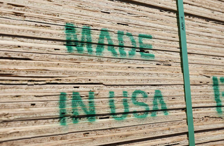 Stacks of U.S. lumber are stamped "Made in USA" and available for sale at Home Depot last month in Pasadena, Calif.