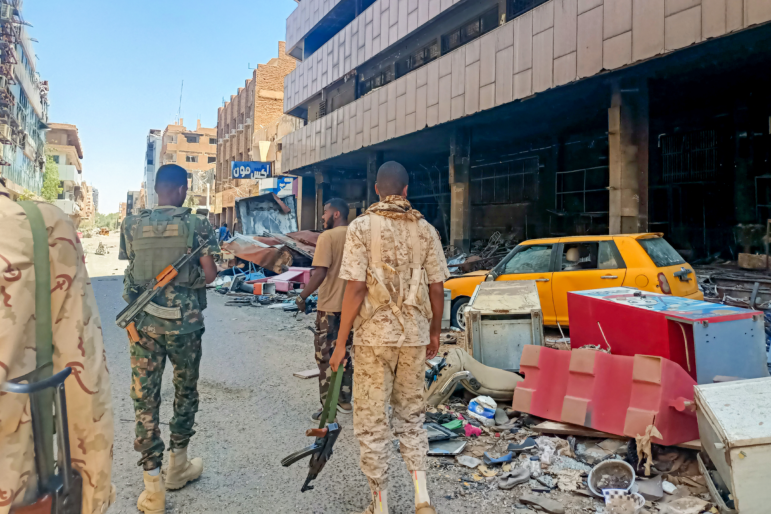 Army soldiers patrol a market area in Khartoum on March 24, 2025. For nearly two years, Sudan has been ravaged by a war between the regular army and the RSF, a conflict that has killed tens of thousands of people, uprooted over 12 million more and created the world's largest hunger and displacement crises.
