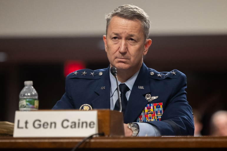 Dan Caine testifies at a Senate hearing.