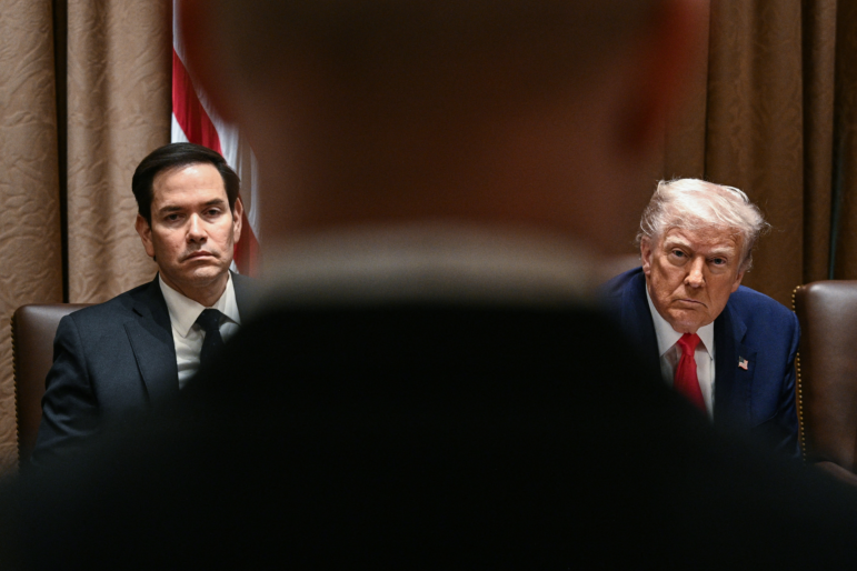 President Trump and Secretary of State Marco Rubio (left) attend a cabinet meeting at the White House on April 10. Trump on Thursday warned of the "transition cost" from his tariff policies, as Wall Street stocks fell again over the worsening trade war with China.