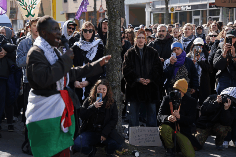 Demonstrators protest in Berlin against the possible deportation of four foreign pro-Palestinian activists from Germany on April 7. The four, including two from Ireland, one from Poland and one from the United States, face order to leave relating to their participation in a protest at Berlin's Free University last year over Israel's invasion of Gaza. City authorities have ordered the four to leave Germany or face deportation.