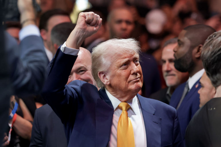 President Trump prepares to watch the Ultimate Fighting Championship at the Kaseya Center on Saturday in Miami, Fla.