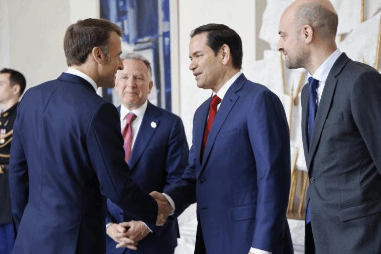 French President Emmanuel Macron (left) shakes hands with U.S. Secretary of State Marco Rubio next to special envoy Steve Witkoff (center) and France's foreign minister, Jean-Noël Barrot, before a meeting at the Élysée presidential palace in Paris on Thursday.