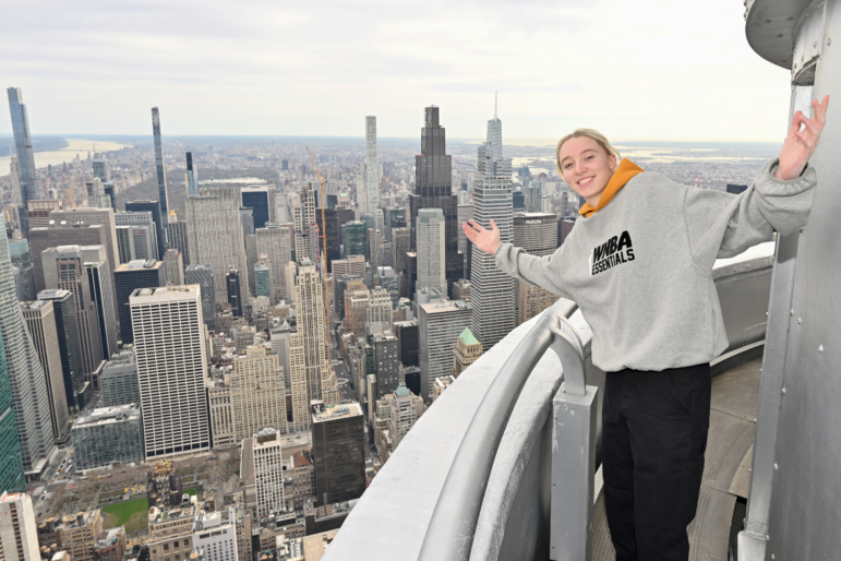 WNBA draftee Paige Bueckers lights the Empire State Building on Monday in New York City. Bueckers, a standout at the University of Connecticut, is expected to be the top pick in Monday evening's WNBA draft.