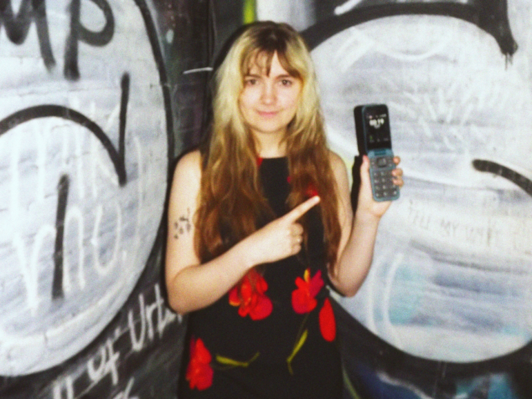 August Lamm two years into her dumbphone journey in New York, July 2024.