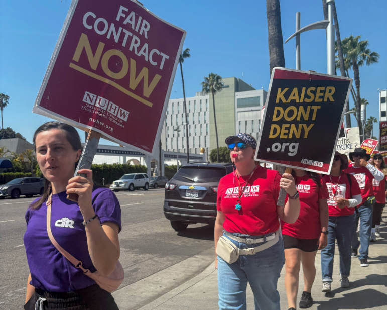 Mental health workers protest outside the Kaiser Permanente Los Angeles Medical Center on a strip of Sunset Blvd. They are heading into their sixth month of striking over wages, benefits and time in between patients.
