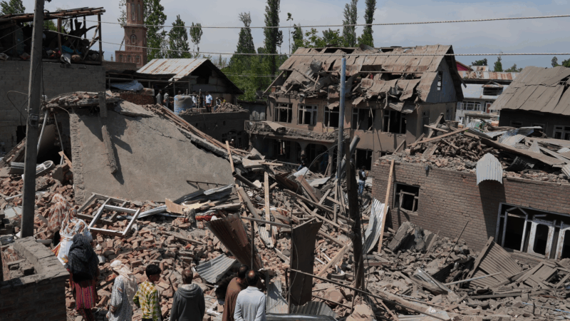 https://wbhm.org/wp-content/uploads/2025/04/people-stand-near-the-razed-house-of-kashmiri-militant-ahsan-ul-haq-sheikhs-family-house-in-murran-area-of-pulwama-district-on-april-26-2025-800x450.png