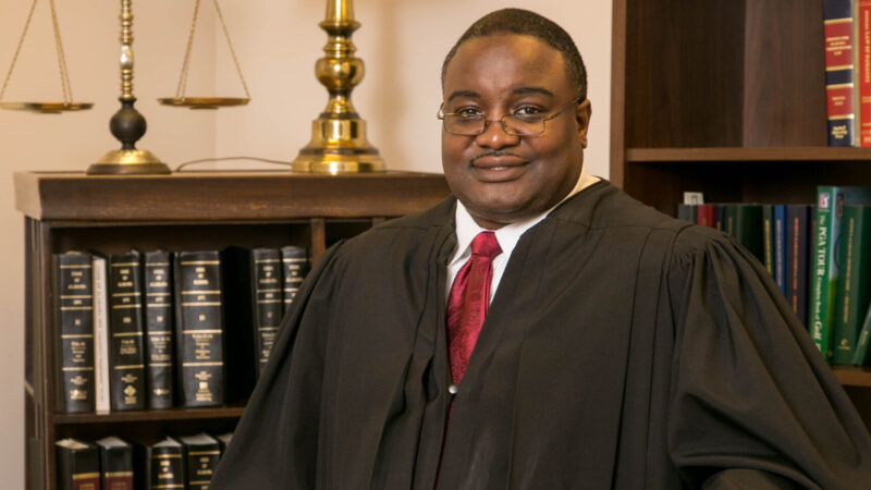 https://wbhm.org/wp-content/uploads/2025/05/Judge_Bill_Lewis_Official_Headshot-scaled-e1747821432347-800x450.jpg