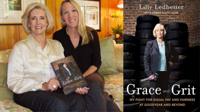 Lilly Ledbetter and Lanier Isom with Isom’s biography about Ledbetter.