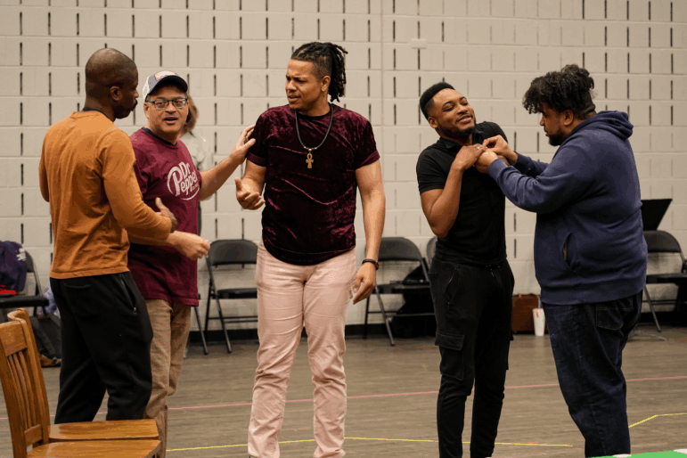 Justin Hopkins, left, Nathan Granner, David Morgans, Markel Reed and Chaz'men Williams-Ali rehearse a scene for Detroit Opera's performances of Anthony Davis' opera The Central Park Five on May 10, 16 and 18