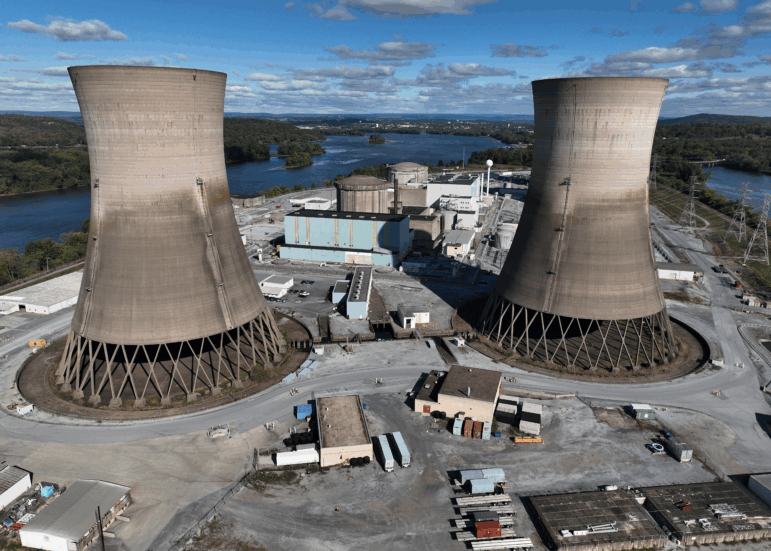 The shuttered Three Mile Island nuclear power plant stands in the middle of the Susquehanna River on October 10, 2024. One of the plant's two reactors partly melted down in 1979, but the second one operated for decades before it was closed. It is now set to be restarted as early as 2028, pending approval by the Nuclear Regulatory Commission.
