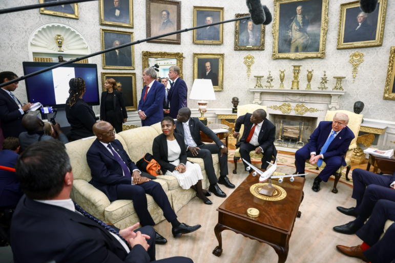 US President Donald Trump, right, and Cyril Ramaphosa, South Africa's president, second right, as a video plays during a meeting in the Oval Office of the White House in Washington, DC, US, on Wednesday, May 21, 2025.