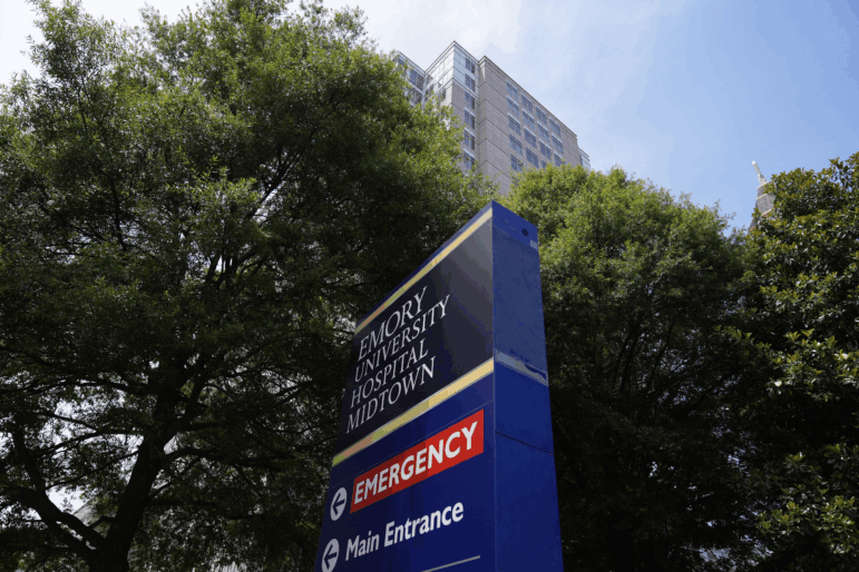 Adriana Smith is a patient at Emory University Hospital Midtown in Atlanta. Emergency complications early in her pregnancy led to brain death, but she remains on life support as the pregnancy continues, according to her family. Her case has become a symbol of the medical and ethical issues stemming from a Georgia law that bans most abortions and confers fetal "personhood" rights.