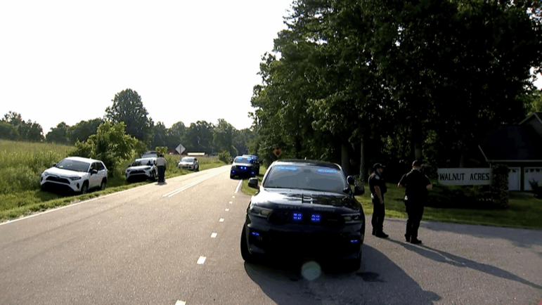 In this image taken from WSOC video, various police vehicles gather outside a community after a mass shooting, Sunday, June 1, 2025, in Hickory, a city in Catawba County, N.C. (WSOC via AP)