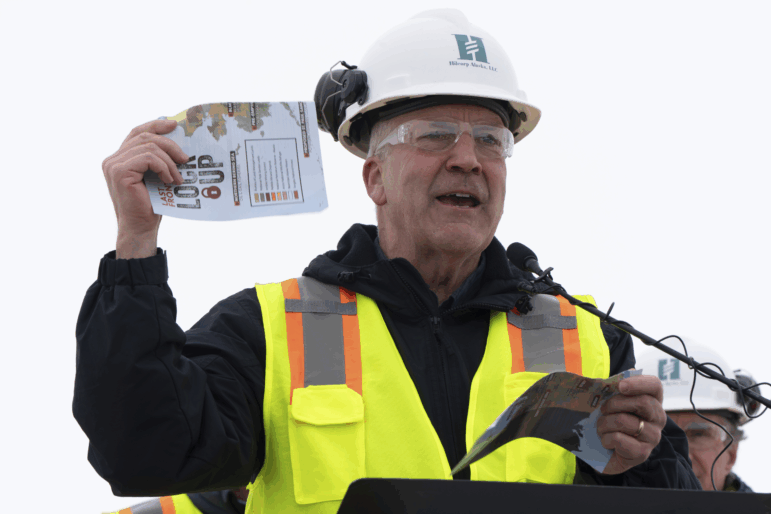 Sen. Dan Sullivan, R-Alaska, rips up a piece of paper that had plans from the Biden administration during a news conference at the Pump Station 1 on Monday, June 2, 2025, located near Deadhorse, Alaska, on the state's prodigious North Slope.
