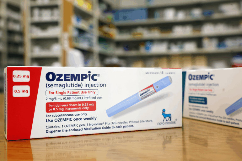 Boxes of the diabetes drug Ozempic rest on a pharmacy counter in Los Angeles.