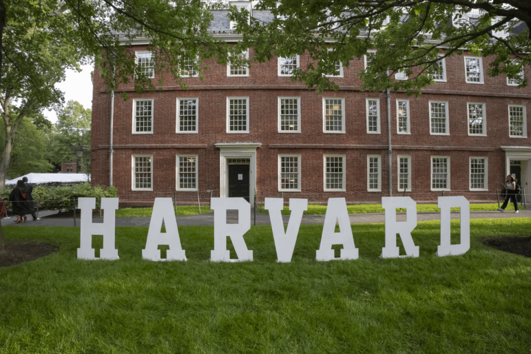 A Harvard sign is seen at Harvard University's campus in May.