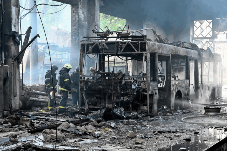 Ukrainian rescuers work to extinguish a fire in a trolleybus depot following a drone strike in Kharkiv on Friday, amid the Russian invasion of Ukraine. Ukraine said on Thursday it was ready to hold more talks with Russia in Istanbul next week but again demanded that Moscow supply a document setting out its conditions for peace.