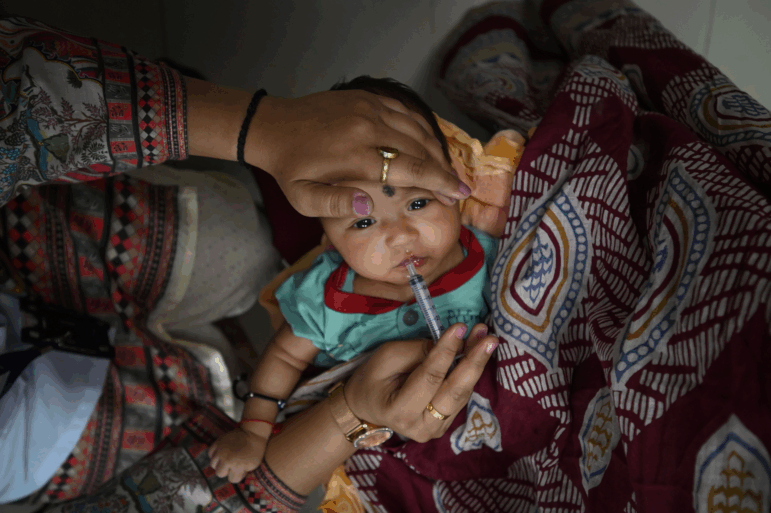 NEW DELHI, INDIA - JUNE 17: A child seen getting the vaccination inside the newly inaugurated Ayushman Arogya Mandir at Tis Hazari Court Complex on June 17, 2025 in New Delhi, India. Ayushman Arogya Mandir scheme is being started in place of Mohalla Clinic in Delhi. Doctors and medical staff appointed in it will be given a monthly salary. Along with this, many tests and facilities have also been added. 1139 Ayushman Arogya Mandirs are to be built in Delhi at a cost of 2406 crores. 33 Ayushman Arogya Mandirs have been built in Delhi Government, Municipal Corporation and New Delhi Municipal Council (NDMC) dispensaries.