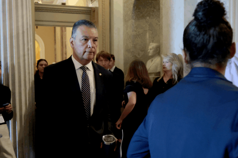 Sen. Alex Padilla, D-Calif., walks to the Senate chambers on Tuesday to deliver his first remarks on the Senate floor since he was forcefully removed from a DHS press conference last week.