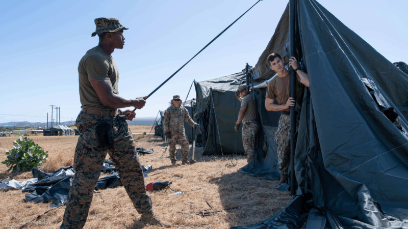 https://wbhm.org/wp-content/uploads/2025/06/gitmo-tents-800x450.png