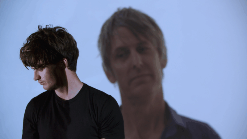 https://wbhm.org/wp-content/uploads/2025/06/joe-with-projected-malkmus-over-his-shoulder-800x450.png