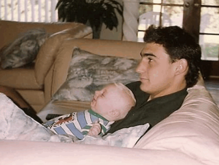 Alek Hermon as a baby with his father, Michael, in 1992.