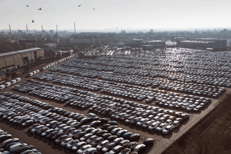 New German cars are stored at a logistic center in Essen, Germany, Monday, Feb. 3, 2025.