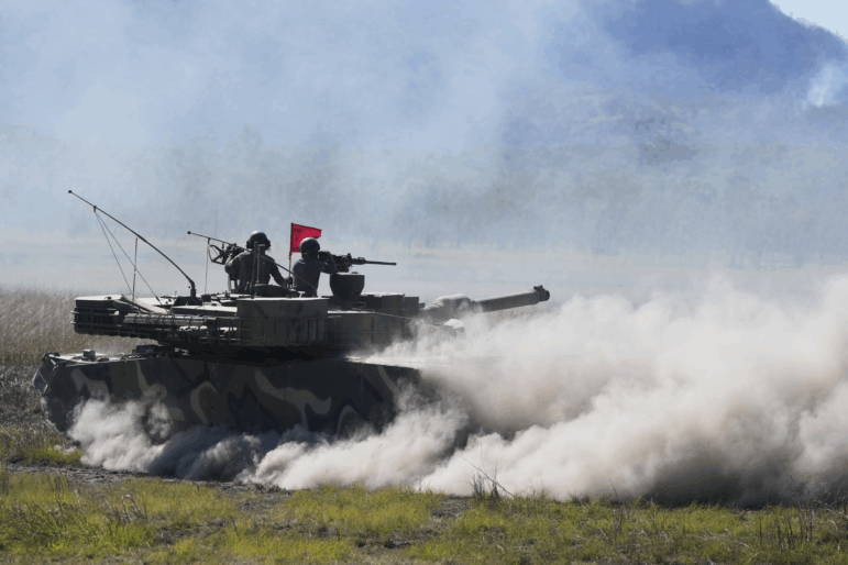 South Korean soldiers fire from a K1 tank during Exercise Talisman Sabre 2025, Australia's largest-ever war fighting drills at Shoalwater Bay Training Area, near Rockhampton, Australia, on Monday.