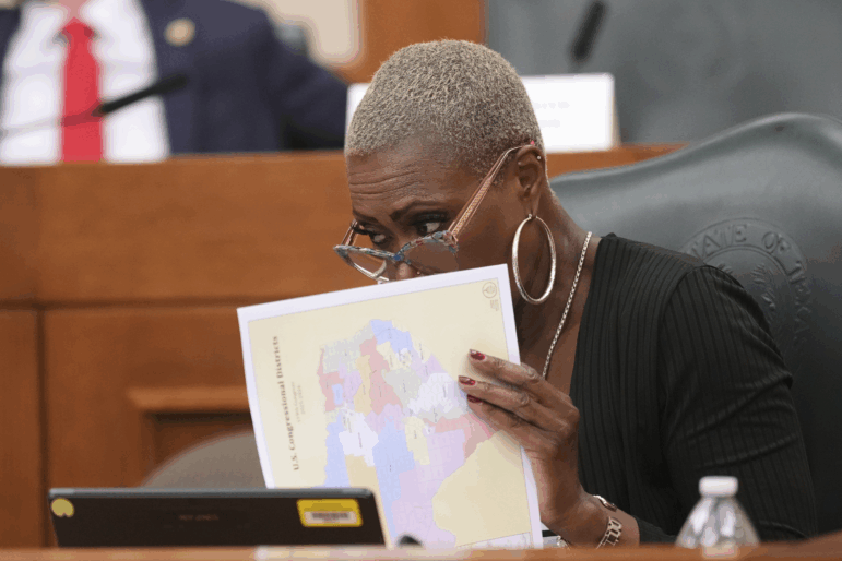 Texas state Rep. Jolanda "Jo" Jones looks through congressional maps during a redistricting hearing at the Texas Capitol in Austin on July 24.