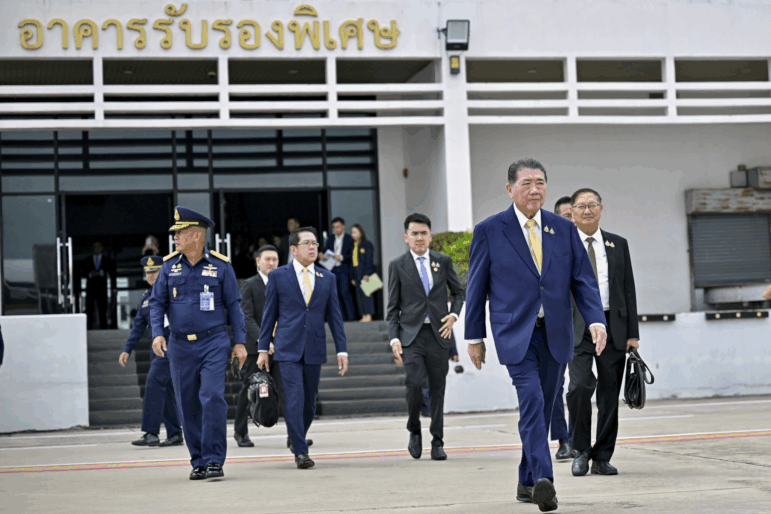 In this photo released by The Government Spokesman Office, Thailand's acting Prime Minister Phumtham Wechayachai, front, departs from Military Airport in Bangkok, to Malaysia, to attend a meeting to discuss regional peace at the Prime Minister's Office of Malaysia, with Cambodian Prime Minister Hun Manet on July 28, 2025.