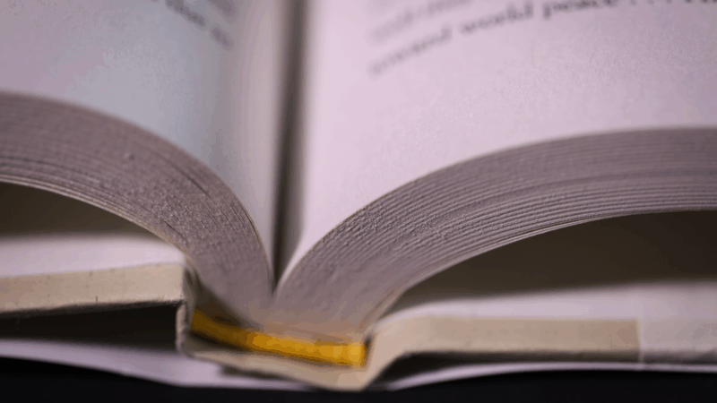 https://wbhm.org/wp-content/uploads/2025/07/book-spine-open-close-3-credit-becky-harlan-npr-800x450.png