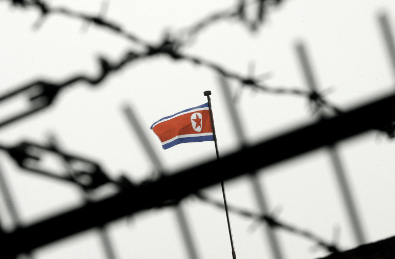 The North Korean flag files over the North Korean embassy in Beijing, 18 July 2007.