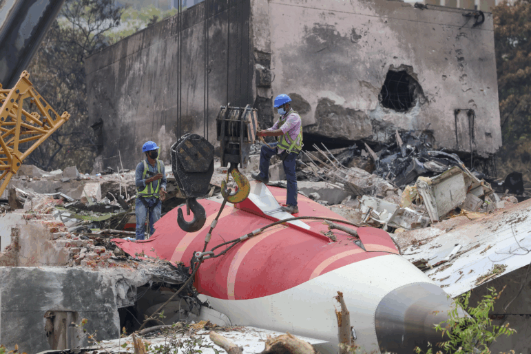Members of the Indian Army's engineering team prepare to remove the wreckage of an Air India Boeing 787 Dreamliner aircraft, bound for London's Gatwick Airport, which crashed during take-off from an airport in Ahmedabad, India June 14, 2025.