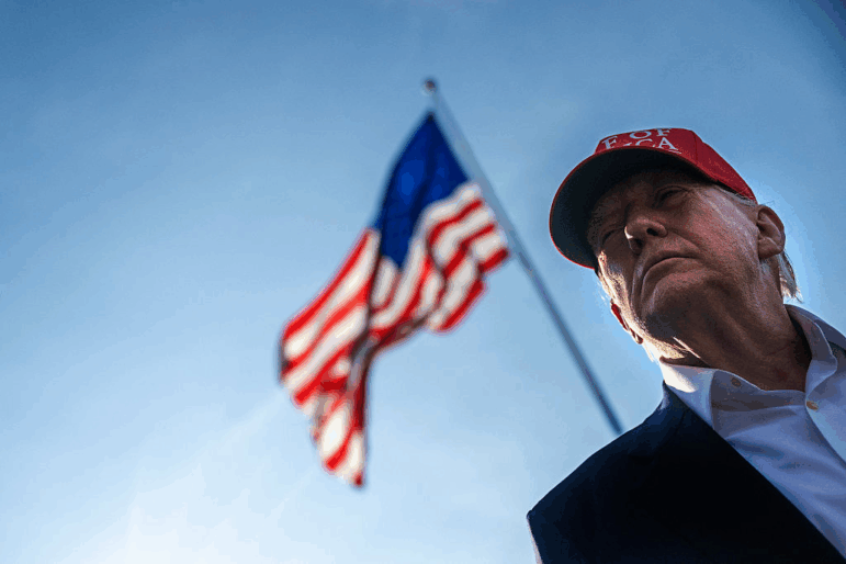 President Trump talks to members of the press as he departs from the South Lawn of the White House on Tuesday.