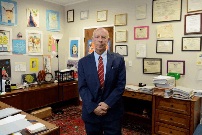 Immigration attorney Stephen Born poses for a photo in his office on July 30, 2025 in Everett, Mass.