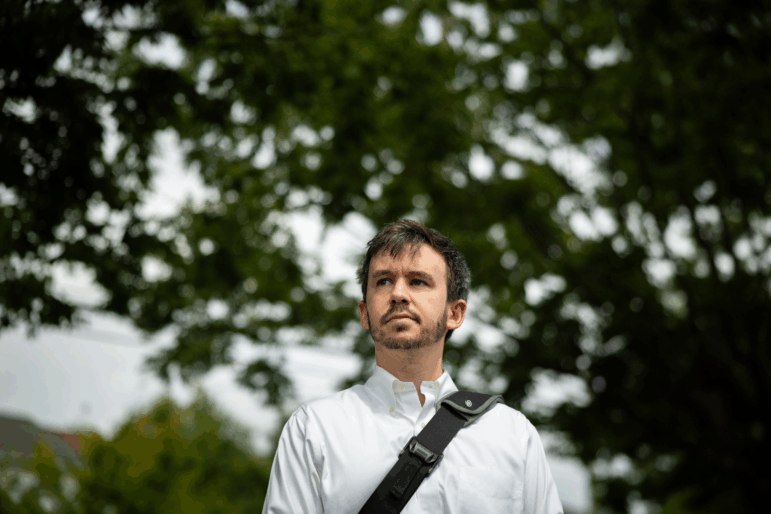 Joe McLean, a lawyer, poses for a portrait in southeast Washington, D.C., on August 13, 2025. McLean worries about the deployment of the National Guard and federal police, and believes it is unnecessary. Credit: Maansi Srivastava/NPR