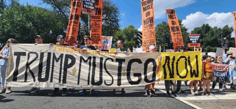 Hundreds of protesters march to White House on Aug. 16, 2025.