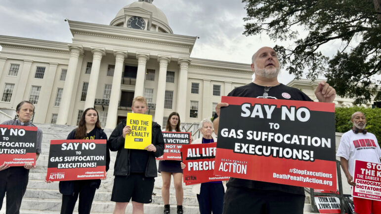 Abraham Bonowitz and other death penalty opponents hold a demonstration outside the Alabama Capitol in Montgomery.