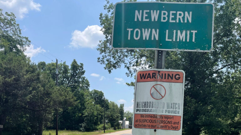 A sign marks the town limit of Newbern, Alabama.