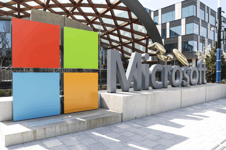 A Microsoft sign and logo are pictured at the company's headquarters, Friday, April 4, 2025, in Redmond, Wash.