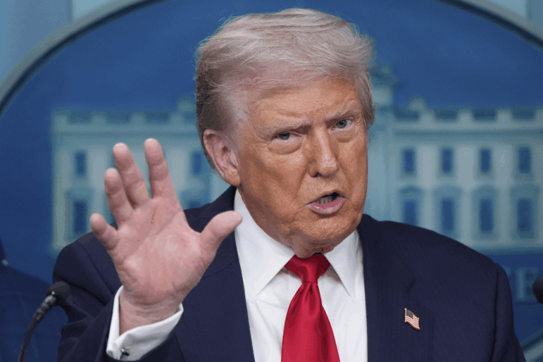 President Donald Trump speaks with reporters at the White House on Aug. 11, 2025, in Washington.