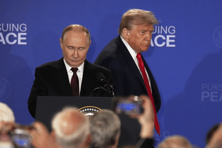 President Donald Trump and Russia's President Vladimir Putin arrive for a joint press conference at Joint Base Elmendorf-Richardson, Alaska, Friday, Aug. 15, 2025.