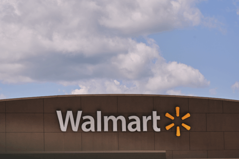 Clouds pass over the Walmart store Aug. 14, 2025, in Manchester, N.H.