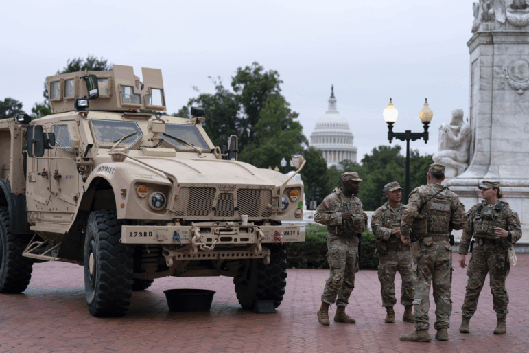 Members of the District of Columbia National Guard patrol outside Union Station, Tuesday, Aug. 19, 2025, in Washington.