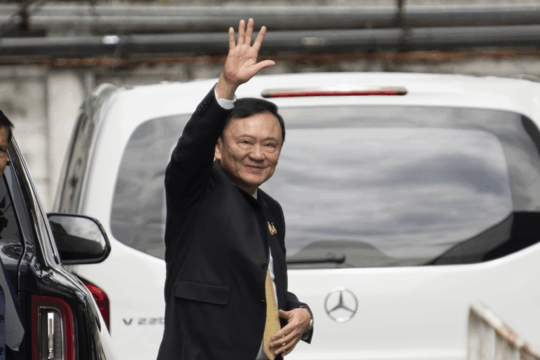 Former Thai Prime Minister Thaksin Shinawatra arrives at Criminal Court for a verdict for allegedly defaming the monarchy in Bangkok on Friday, Aug. 22, 2025.