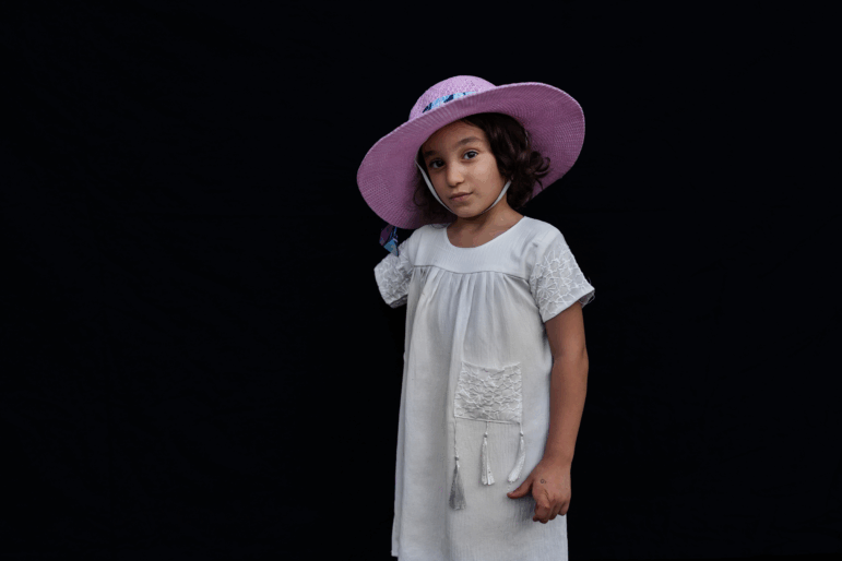 On August 11, 6-year-old Kenzi Madhoun from Gaza posed for a portrait outside the American University of Beirut Medical Center. She arrived in Beirut with her father, Adam Madhoun, to begin treatment after being injured in Gaza on Oct. 21, 2023. She is among nearly 35 children that the Ghassan Abu-Sittah Children’s Fund has brought with their caretakers from Gaza to Lebanon for surgical and psychological support.