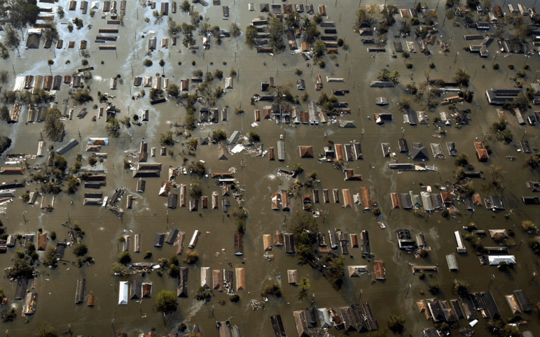 Water surrounds homes in the devastated Ninth Ward in this aerial view of damage from Hurricane Katrina in New Orleans, LA on August 30, 2005.