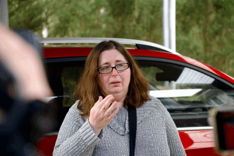 Erin Patterson talks to reporters in August 2023.
