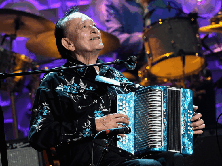The accordion playing of Flaco Jimenez, seen here performing during the 2014 Americana Music Association Honors and Awards Show at the Ryman Auditorium in Nashville, Tenn., came to define contujo and Tejano music of South Texas over a career that spanned more than 70 years.
